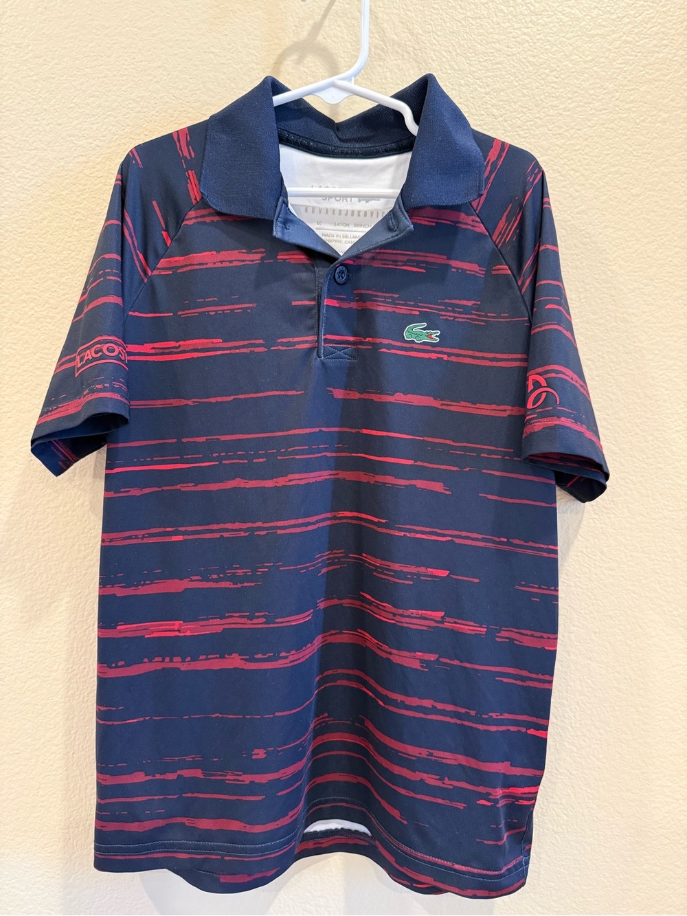 Lacoste Kids Navy Polo with Red Brush Stripe